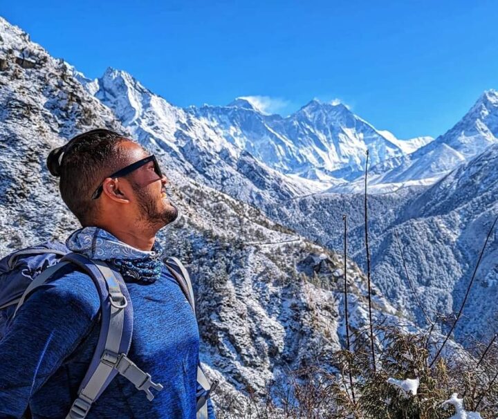 Trekking path leading to Everest Base Camp with stunning views of Mount Everest and surrounding peaks.